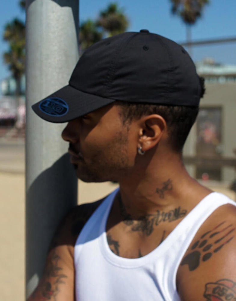 110 Curved Visor Snapback